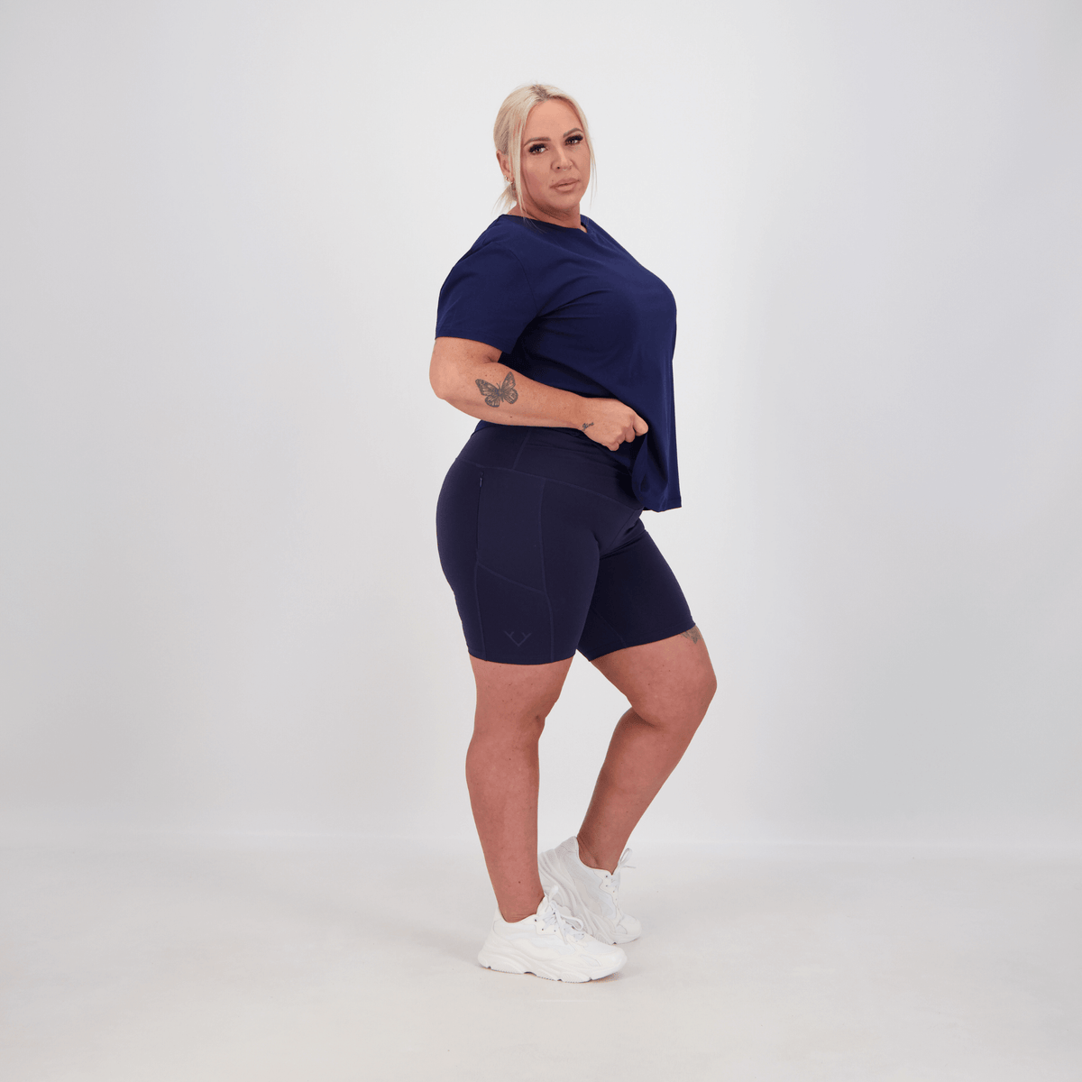 curvy woman wearing tummy taming bike shorts 