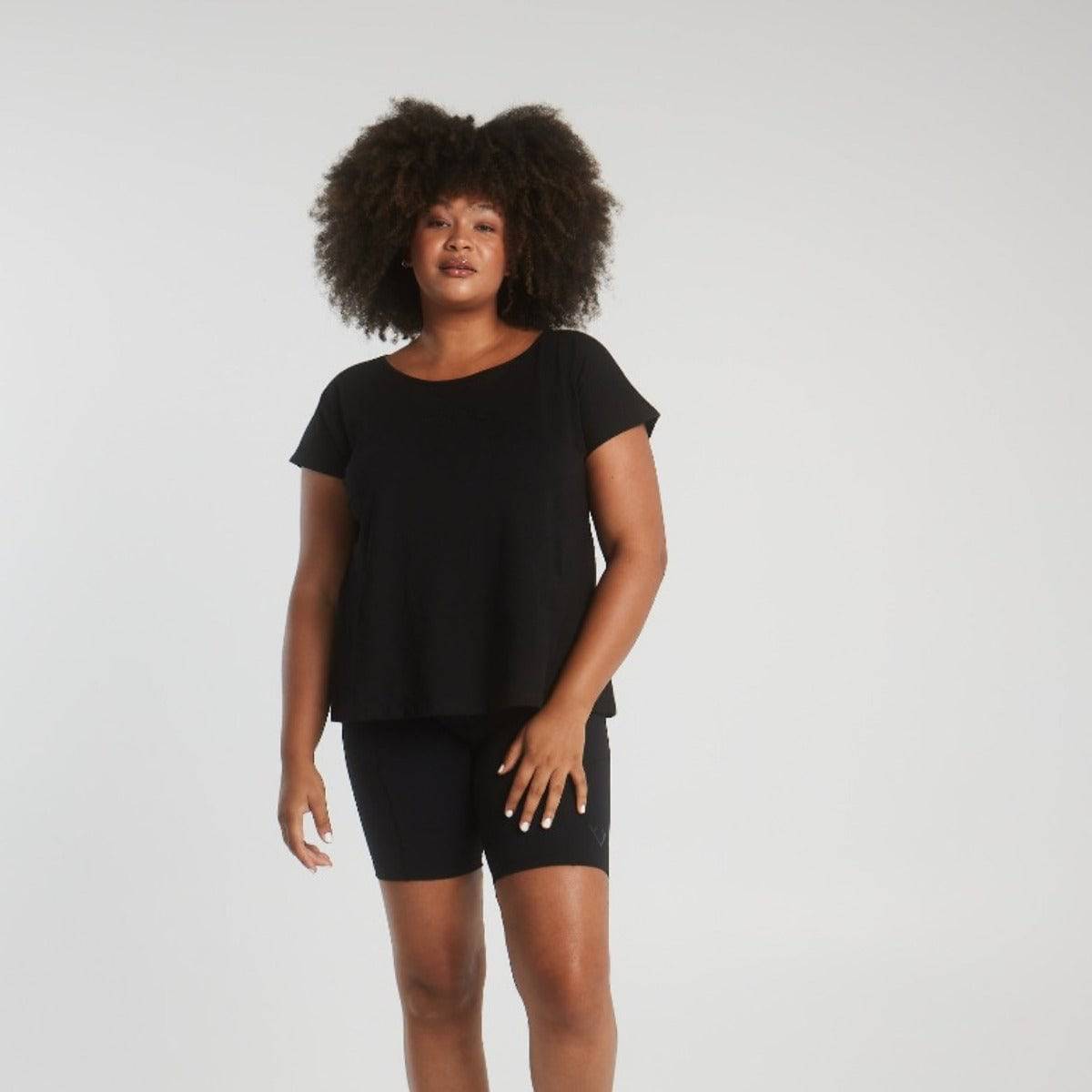 Woman wearing Victoria Stag's Core Cap Sleeved Tee in Black V2