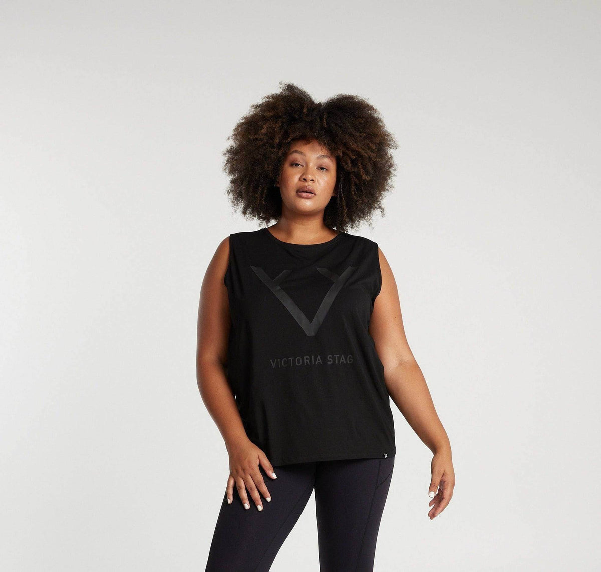 Woman wearing Victoria Stag's Core Muscle Tank in Black