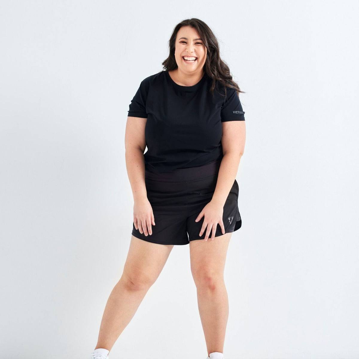 Woman wearing Victoria Stag's Core Running Shorts Extra Stomach Support
